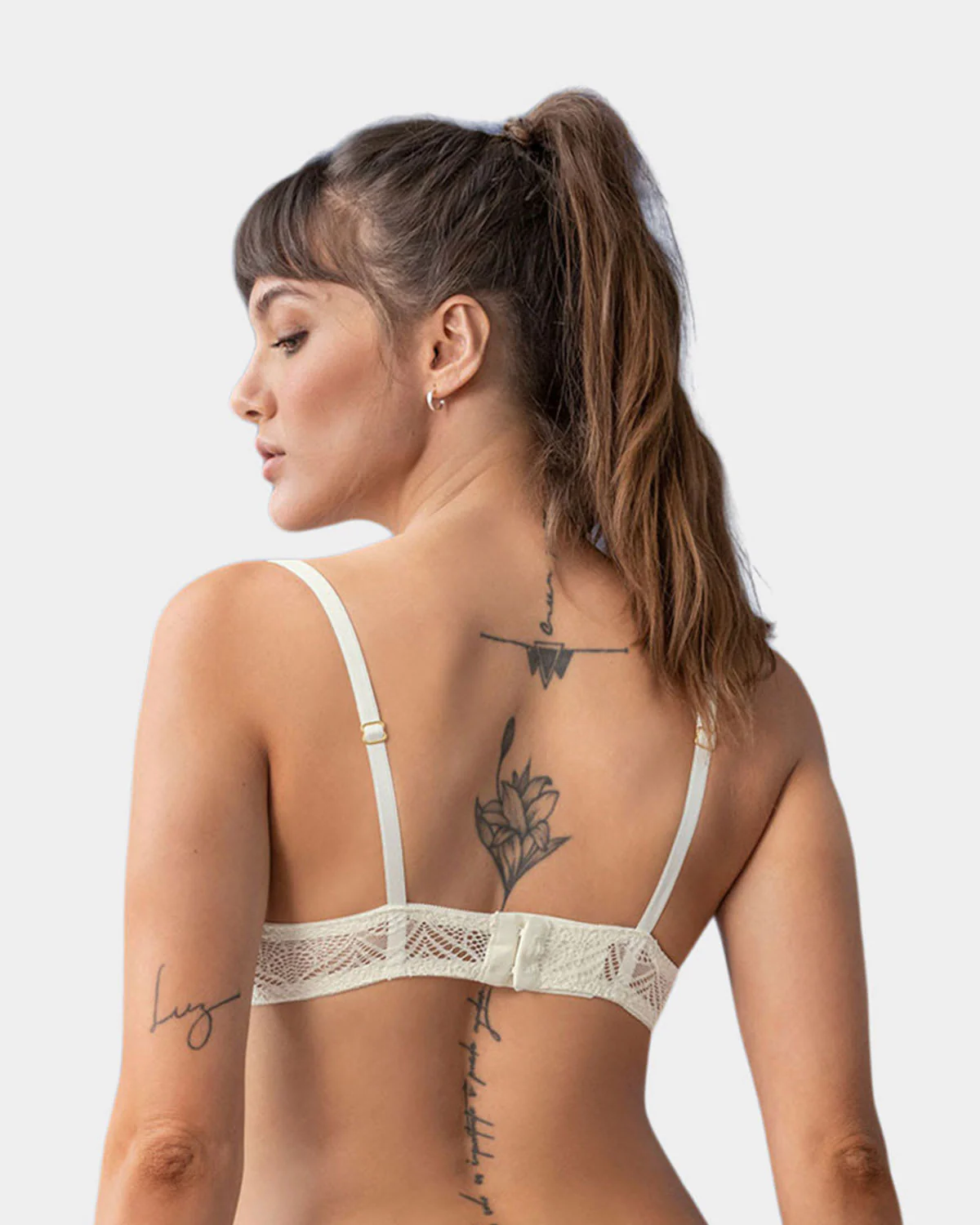 Bralette en encaje con transparencias y arco - Imagen 2